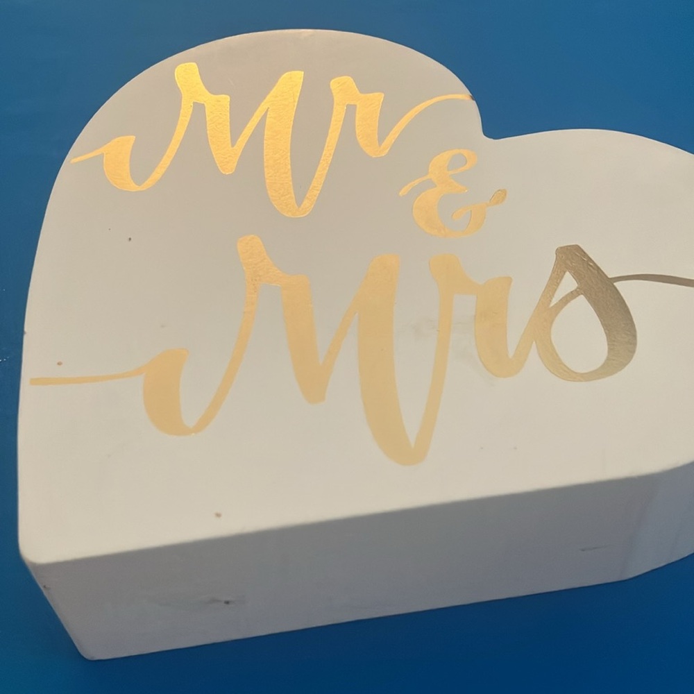 White Heart-Shaped piece with Gold Script